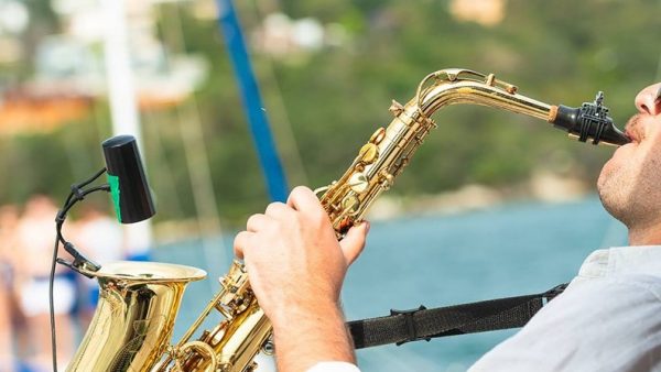 LIVE MUSIC AT SEA Imagine a Miami sunset on a yacht, with your friends and a saxophonist. Yachts N' Roses yacht charter live music at sea